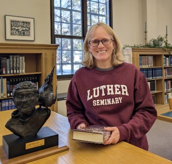Becky in the Luther Seminary Library